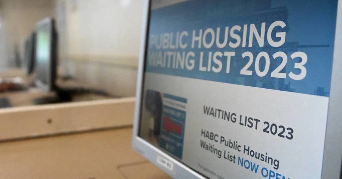 Computer screen features website to apply to Baltimore's public housing waiting list.