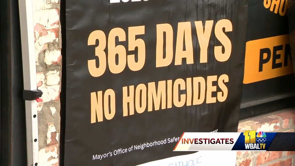 A sign that says 365 days no homicides
